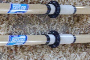 Two dingy oars handles.